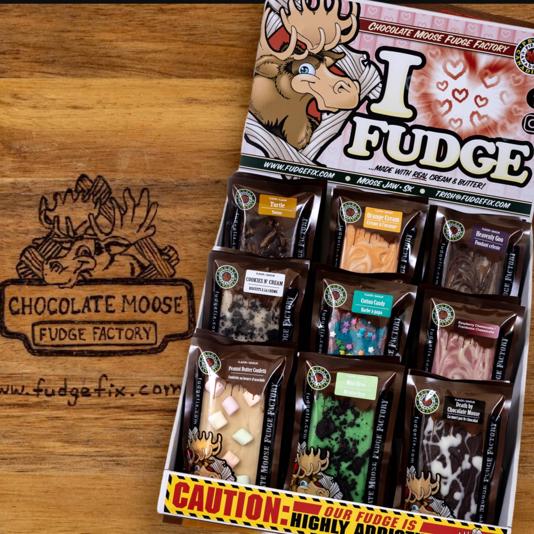 Dive into deliciousness with rich, creamy fudge made in Canada. A sweet escape awaits in every bite! 🍁🍬 
Available in a selection of 9 flavours of fabulous fudge. Flavours: death by chocolate, heavenly goo, turtle, cotton candy,  mint oreo, raspberry cheesecake, cookies and cream, orange cream, peanut butter confetti (Sold Individually).
Chocolate Moose Fudge Factory has been making fudge in small batches for 20 years! Mastering the most delicious fudge ever! Fudge that will leave you wanting more! Mad