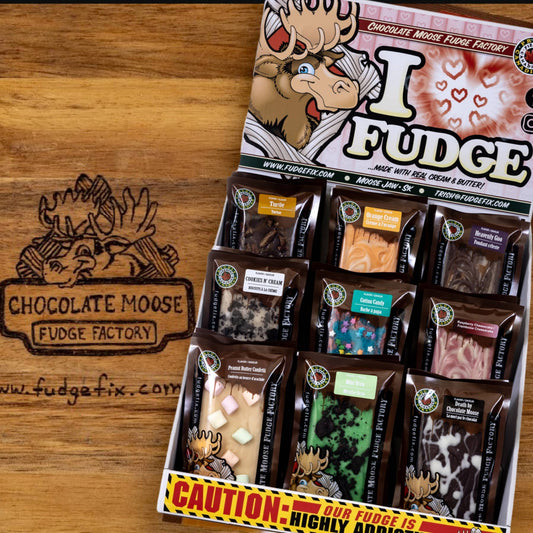 Dive into deliciousness with rich, creamy fudge made in Canada. A sweet escape awaits in every bite! 🍁🍬 
Available in a selection of 9 flavours of fabulous fudge. Flavours: death by chocolate, heavenly goo, turtle, cotton candy,  mint oreo, raspberry cheesecake, cookies and cream, orange cream, peanut butter confetti (Sold Individually).
Chocolate Moose Fudge Factory has been making fudge in small batches for 20 years! Mastering the most delicious fudge ever! Fudge that will leave you wanting more! Mad