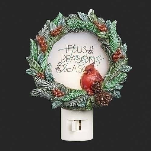 This beautiful 5" wreath features a stunning cardinal design and a heartfelt message: "Jesus is the reason for the Season". The wreath also includes a convenient swivel plug that allows you to easily display it in any outlet. Enjoy the warm glow of this nightlight and the meaning it brings to your home.