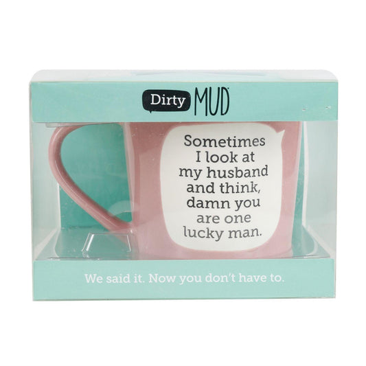 Description
Let your mug do the talking with this hilarious line of Dirty Mud mugs from Our Name is Mud. With a pre-written speech bubble, this snarky pink cup explains how lucky your husband is to have a spouse like you!
Message: Sometimes I look at my husband and think damn, you are one lucky man.