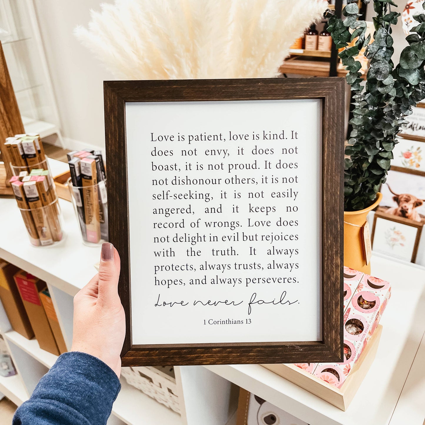 Knotty Design Co. - Love Never Fails Framed Wood Sign