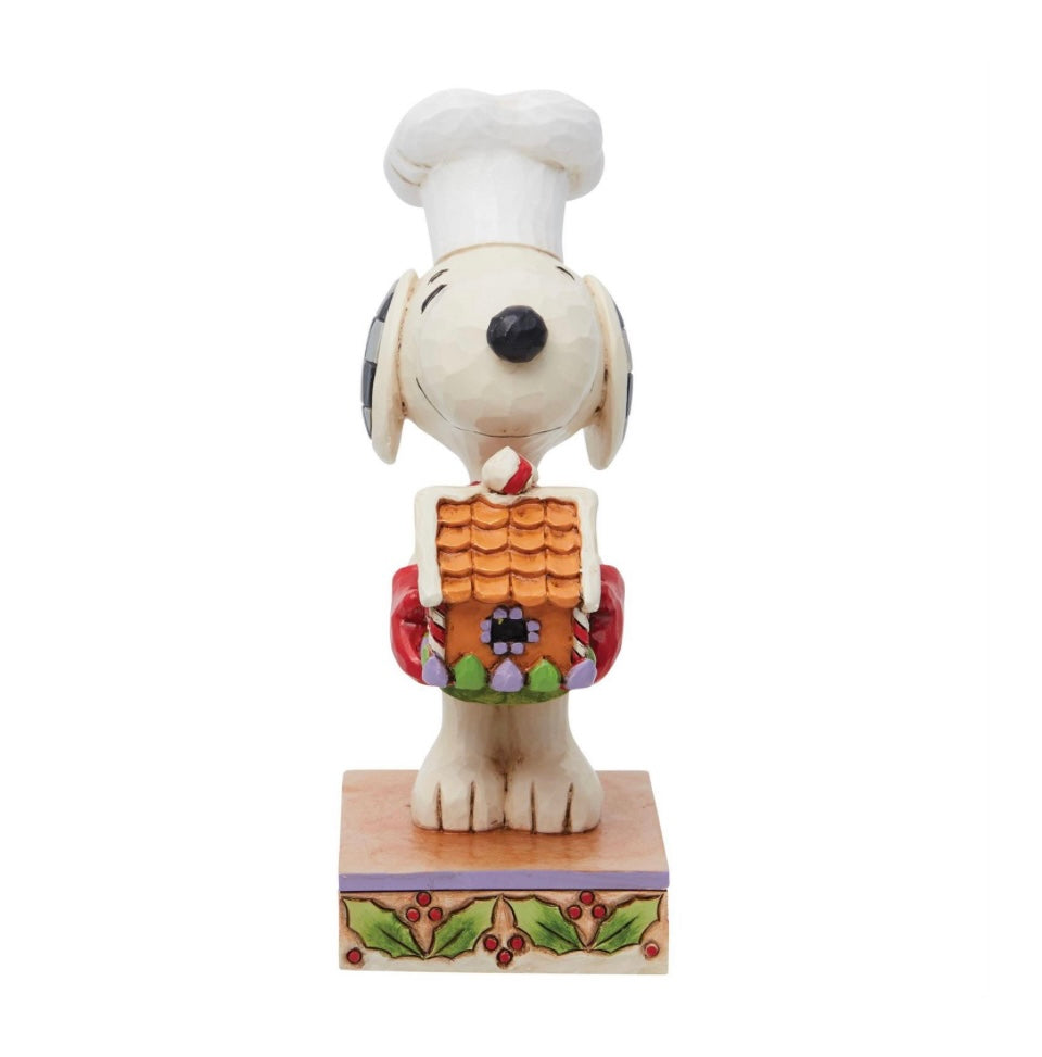 Snoopy Holding Gingerbread House
