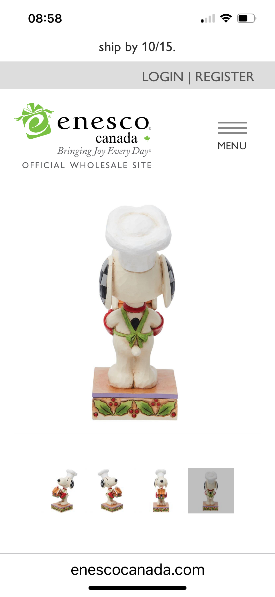 Snoopy Holding Gingerbread House