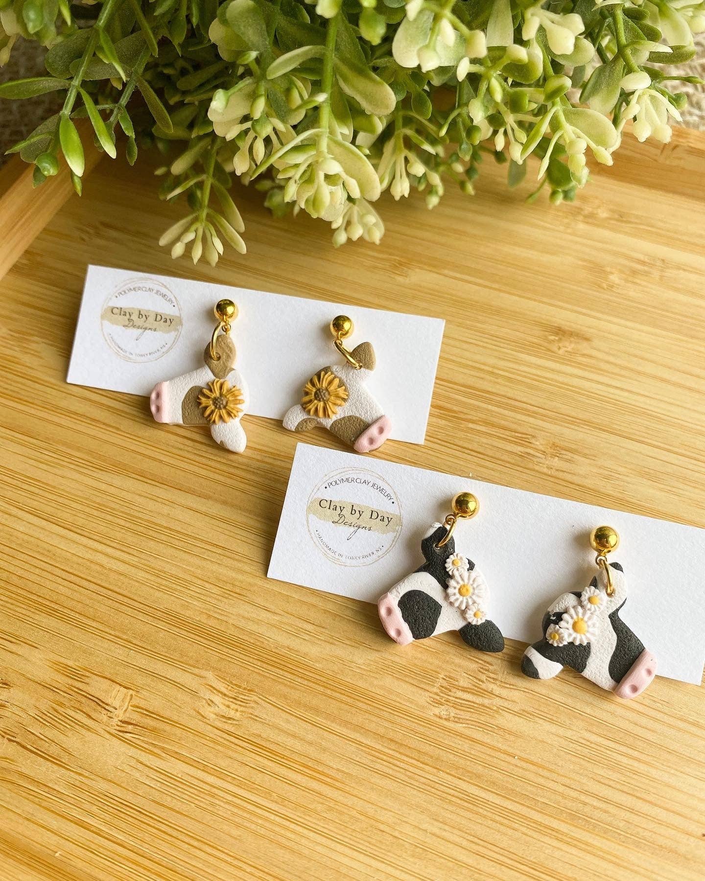 Clay by Day Designs - Floral Crown Cow. Country western  - polymer clay earring : Brown with Sunflower
