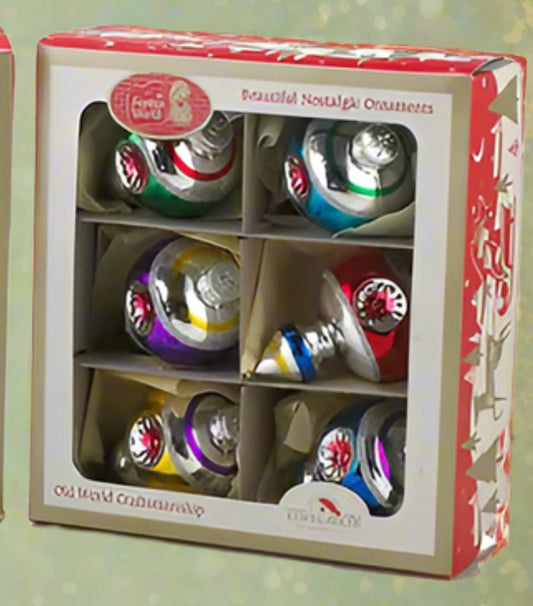 These Kurt Adler Early Years glass ornaments are a beautiful addition to any holiday décor or Christmas tree. Features shiny vintage style ornaments with glitter embellishments. Finial shapes, painted with bright colours and adorned with glitter. Warning, known to cause pings of nostalgia & beautiful memories. Will also create some new memories for your own loved ones. Comes in vintage style box

Part of Kurt Adler's Early Years collection
Made of glass
A Vintage touch to any holiday décor or Christmas tree