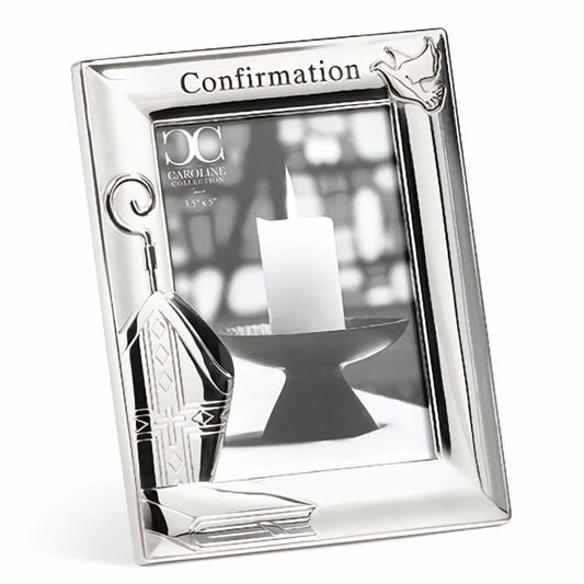 Roman Giftware Confirmation Photo Frame #26023R.

Celebrate the special occasion of Confirmation with this elegant Confirmation Frame, featuring a beautiful design with a dove, bishop's hat, and crozier. The frame is perfect for displaying a cherished 3.5x5 photo, making it an ideal keepsake for this important sacrament. Crafted with attention to detail, it serves as a meaningful reminder of the Holy Spirit's presence and guidance. This frame makes a thoughtful gift for those receiving the sacrament of Conf