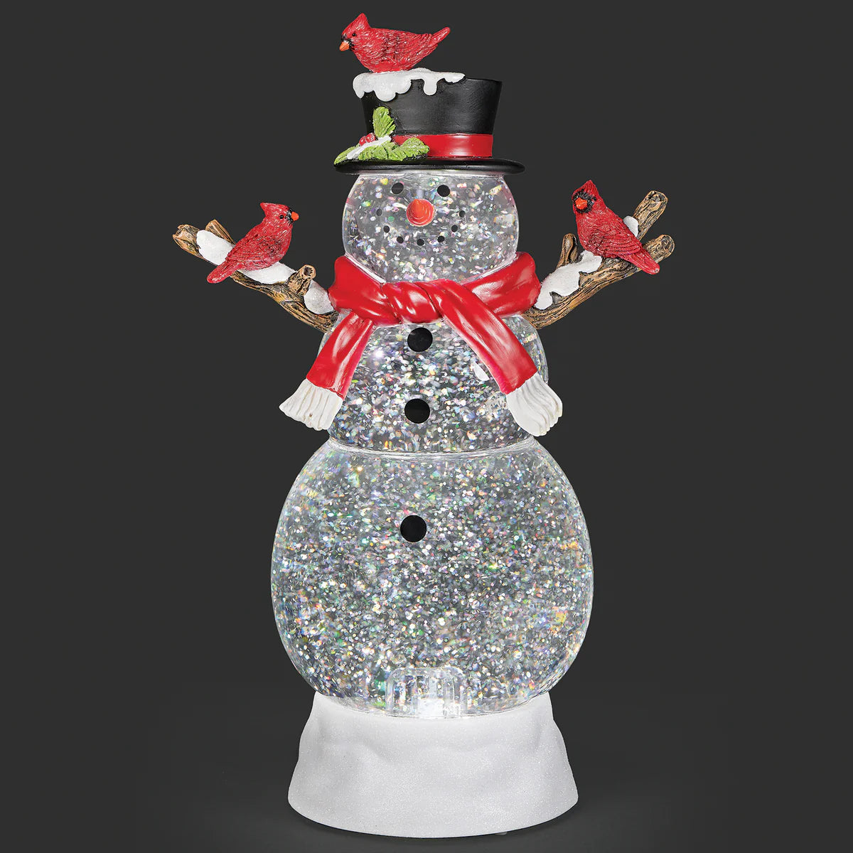 Add a touch of nature’s winter magic to your holiday decor with this charming lighted swirl snowman, beautifully accented by bright red cardinals. Swirling glitter and a soft, gentle glow create a tranquil, festive scene that brings peace, warmth, and seasonal charm to any space during the holidays.

Material: Acrylic

Power: USB cord included or 3 AA batteries required (not Included)

Size: 12" H