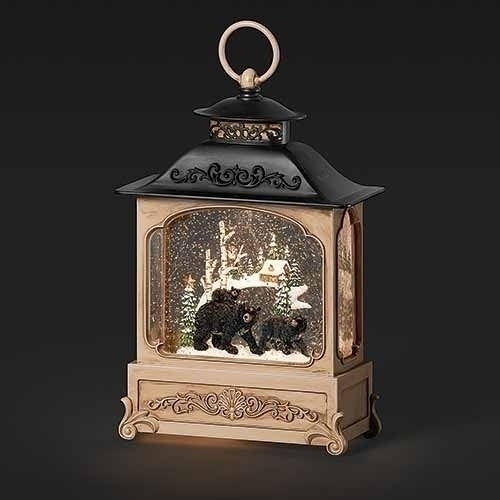 Expertly crafted, this 10.5"H lighted swirl lantern showcases a charming Bear Family waterglobe, encased in a gazebo with scenic backdrops. Its elegant design will add warmth and character to any room, evoking feelings of coziness and nostalgia. A must-have for lovers of rustic and nature-inspired decor.

