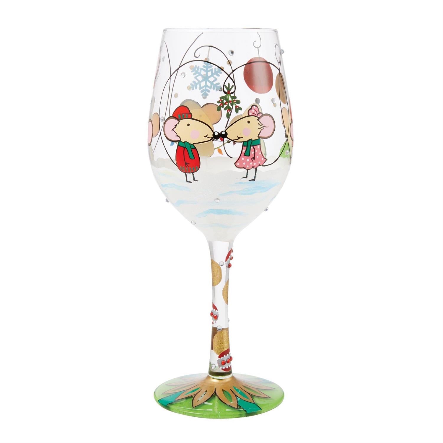 This festive hand-painted wine glass by Lolita shares a scene of Christmas mice stirring about! Dressed in winter clothes and caring presents, the mice enjoy sparkling ornaments and lavish crystals. This playful cup wishes you a merry christ-mouse!

Wine Glasses
15 Oz. Capacity
Not Even a Mouse from Designs by Lolita