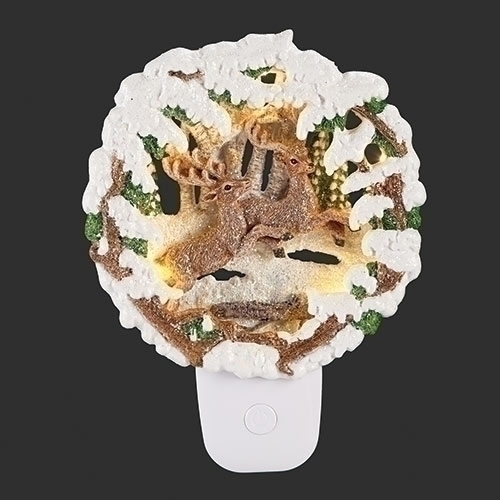 7"H NIGHTLIGHT LEAPING DEER
FRAMED IN SNOW; SWIVEL PLUG by Roman #160407