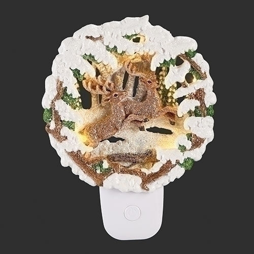 7"H NIGHTLIGHT LEAPING DEER
FRAMED IN SNOW; SWIVEL PLUG