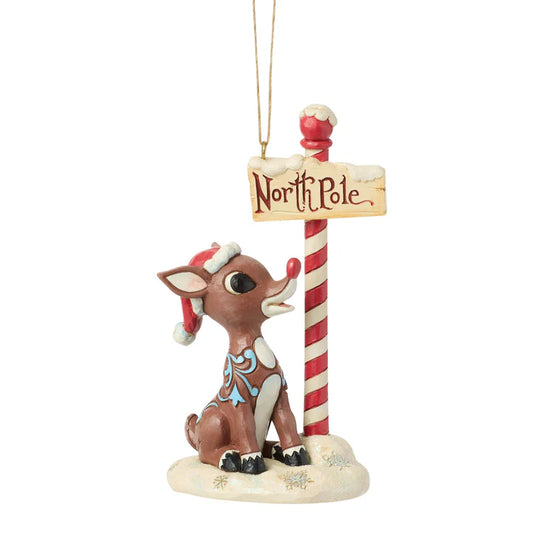 Rudolph by North Pole Sign