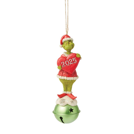 Perched atop a gleaming jingle bell, the Grinch grins in his Santa suit, holding a heart marked with the year 2025. This festive Jim Shore ornament reminds us to live in the moment and create holiday moments worth remembering for years to come.

Hanging Ornament
5.5in H
Jim Shore Grinch Collection- Dated 2025 Real bell
Jim Shore's unmistakable style evokes a sense of nostalgia with traditional themes quilt pattern and motifs inspired by American and European folk art
Beautifully hand-painted and crafted fro