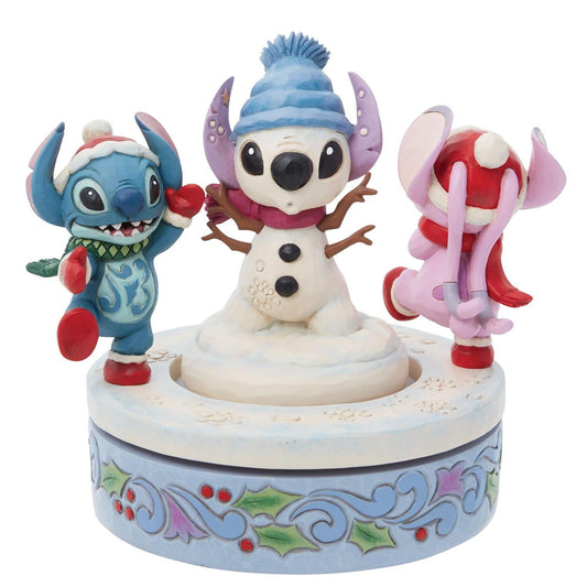 Jim Shore, Stitch & Angel Building a Snowman