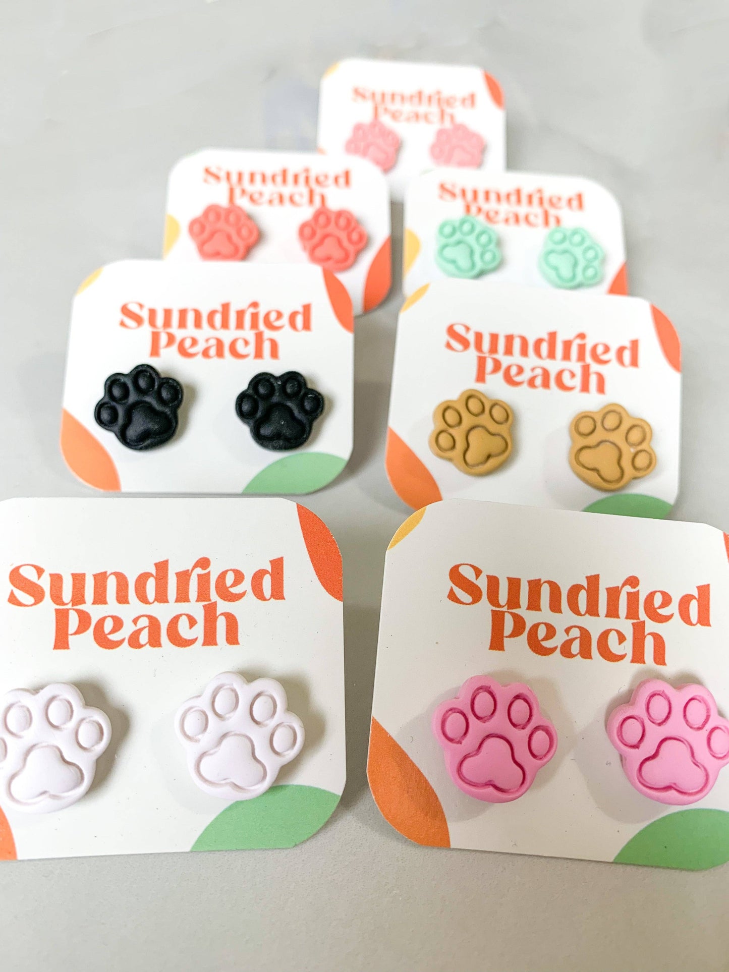 Sundried Peach - Paw Studs: Black