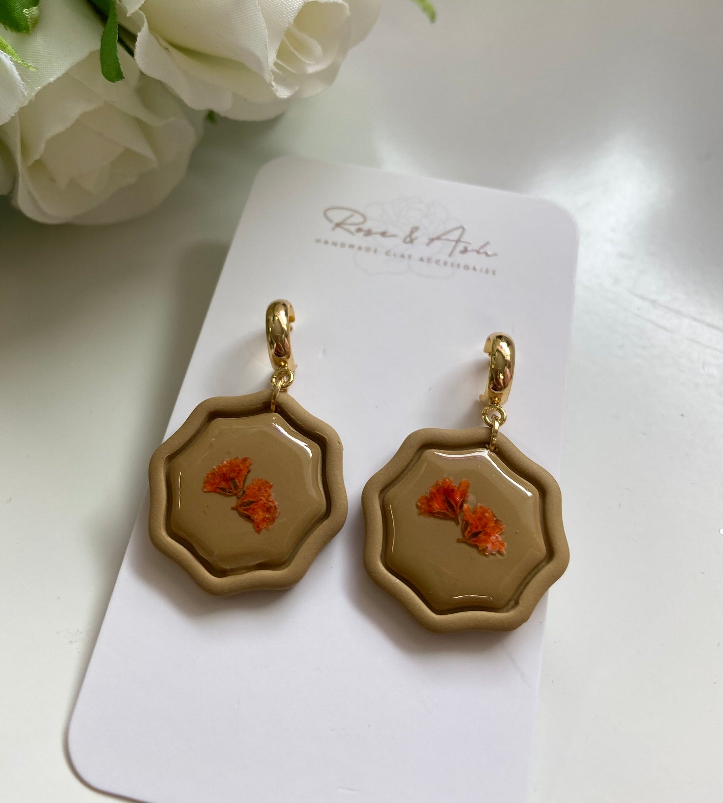 Yellow Earrings with Embossed  Orange Flower